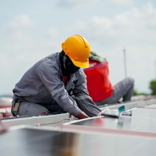 engineer-service-check-installation-solar-cell-on-S64JBY7.jpg